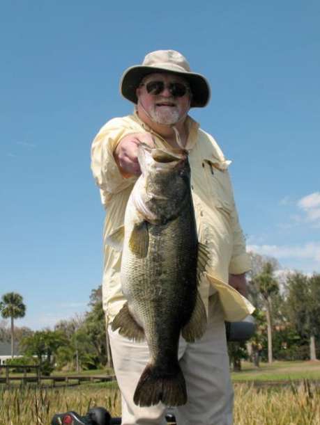 Fisherman holding a bass