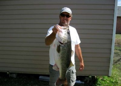 Bass fisherman with catch